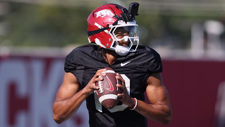 Aug 14, 2025; Fayetteville, AR, USA; Arkansas Razorbacks quarterback Taylen Green (10) drops back to pass during practice. Mandatory Credit: Nelson Chenault-Imagn Images