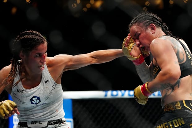 Raquel Pennington fights Julianna Peña in a women’s bantamweight title bout during UFC 307 at Delta Center. 