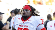 Oct 25, 2025; Tempe, Arizona, USA; Houston Cougars  offensive lineman Jason Brooks Jr. (73) against the Arizona State Sun Devils at Mountain America Stadium. Mandatory Credit: Mark J. Rebilas-Imagn Images