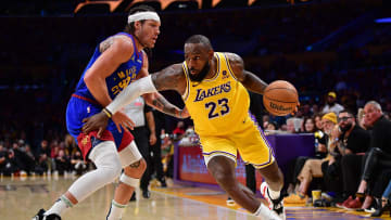 Apr 25, 2024; Los Angeles, California, USA; Los Angeles Lakers forward LeBron James (23) moves to the basket against Denver Nuggets forward Aaron Gordon (50) during the second half in game three of the first round for the 2024 NBA playoffs at Crypto.com Arena. Mandatory Credit: Gary A. Vasquez-USA TODAY Sports
