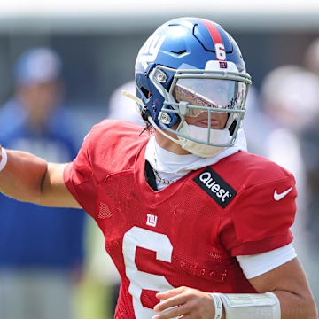 Aug 4, 2025; East Rutherford, NJ, USA;  New York Giants quarterback Jaxson Dart (6) drops back to pass during training camp at Quest Diagnostics Training Center.  