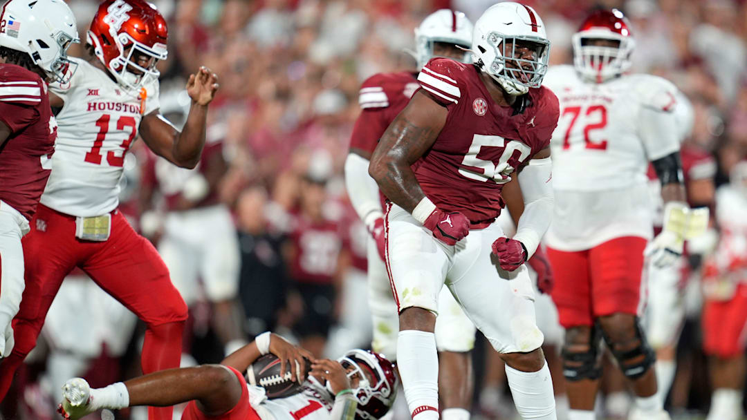 Oklahoma Sooners defensive lineman Gracen Halton (56) celebrates after sacking Houston Cougars quarterback Donovan Smith (1) during a college football game between the University of Oklahoma Sooners (OU) and the Houston Cougars at Gaylord Family – Oklahoma Memorial Stadium in Norman, Okla., Saturday, Sept. 7, 2024.