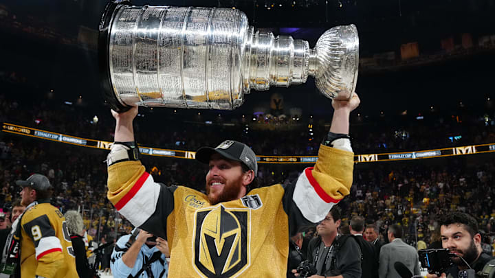 Vegas Golden Knights forward Jonathan Marchessault hoists the Stanley Cup after defeating the Florida Panthers