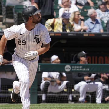 Jun 9, 2024; Chicago, Illinois, USA; Chicago White Sox shortstop Paul DeJong (29) hits a three-run home run against the Boston Red Sox during the fourth inning at Guaranteed Rate Field. Mandatory Credit: David Banks-USA TODAY Sports