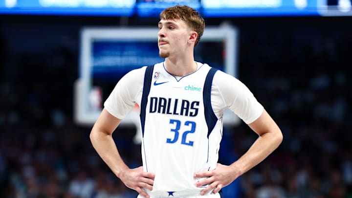 Oct 22, 2025; Dallas, Texas, USA;  Dallas Mavericks forward Cooper Flagg (32) reacts against the San Antonio Spurs during the second half at American Airlines Center.