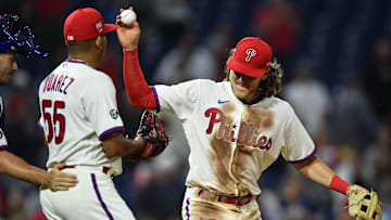 Jul 3, 2021; Philadelphia, Pennsylvania, USA; Philadelphia Phillies infielder Alec Bohm (28) returns a ball to pitcher Ranger Suarez (55) after he closed the ninth inning against the San Diego Padres at Citizens Bank Park. Mandatory Credit: Kyle Ross-Imagn Images