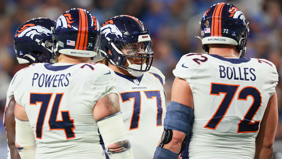 Denver Broncos vs Detroit Lions Denver Broncos guard Quinn Meinerz (77) talks with Denver Broncos offensive tackle Garett Bolles (72) and Denver Broncos guard Ben Powers (74) between plays during an NFL, American Football Herren, USA football game between the Detroit Lions and the Denver Broncos in Detroit, Michigan USA, on Saturday, December 16, 2023. 