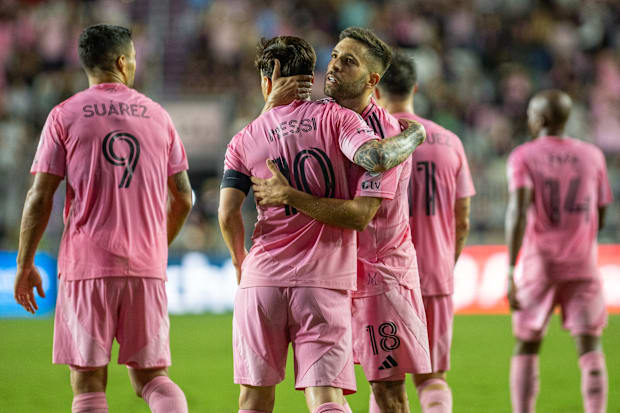 Lionel Messi and Jordi Alba celebrate 