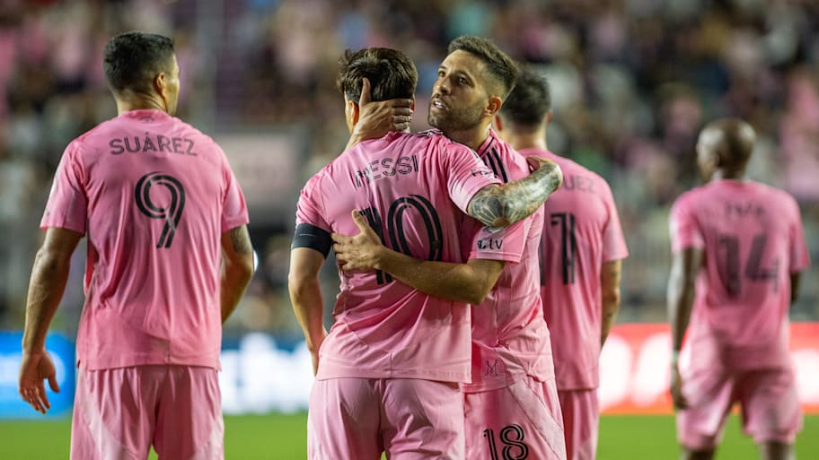 Lionel Messi and Jordi Alba celebrate