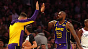  Los Angeles Lakers forward LeBron James (23) celebrates with guard Luka Doncic (77) during the second quarter against the LA Clippers at Crypto.com Arena. 