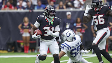 Oct 27, 2024; Houston, Texas, USA; Houston Texans running back Dameon Pierce (31) runs with the ball on the opening kickoff during the first quarter against the Indianapolis Colts at NRG Stadium.