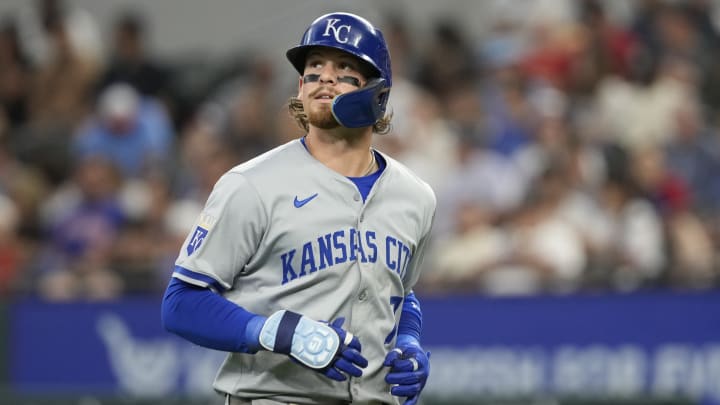 Jun 23, 2024; Arlington, Texas, USA; Kansas City Royals shortstop Bobby Witt Jr. (7) returns to the dugout after grounding out against the Texas Rangers during the seventh inning at Globe Life Field.
