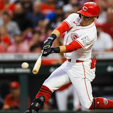 Sep 18, 2024; Cincinnati, Ohio, USA; Cincinnati Reds outfielder TJ Friedl (29) hits a single in the fourth inning against the Atlanta Braves at Great American Ball Park. Mandatory Credit: Katie Stratman-Imagn Images