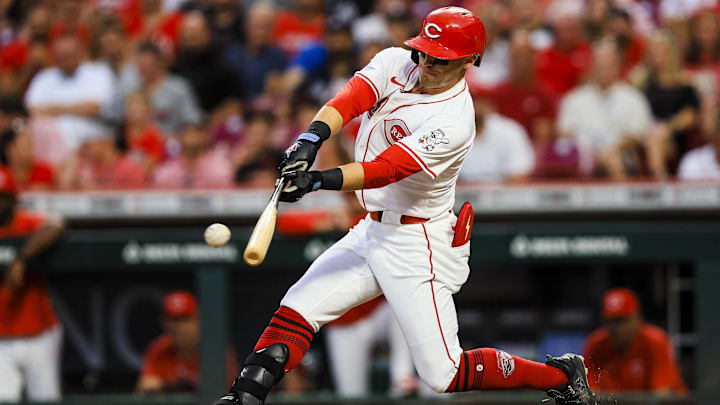 Sep 18, 2024; Cincinnati, Ohio, USA; Cincinnati Reds outfielder TJ Friedl (29) hits a single in the fourth inning against the Atlanta Braves at Great American Ball Park. Mandatory Credit: Katie Stratman-Imagn Images