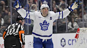 Mar 29, 2025; Los Angeles, California, USA;  Toronto Maple Leafs center John Tavares (91) celebrates after scoring in the third period against the Los Angeles Kings at Crypto.com Arena. Mandatory Credit: Jayne Kamin-Oncea-Imagn Images
