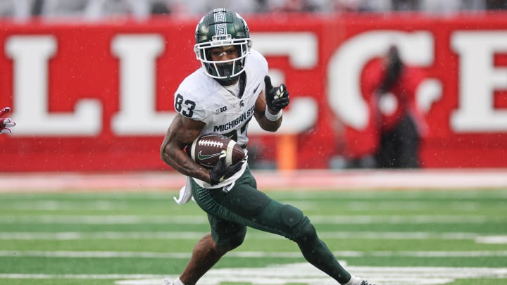 Oct 14, 2023; Piscataway, New Jersey, USA; Michigan State Spartans wide receiver Montorie Foster Jr. (83) gains yards after catch during the second half against the Rutgers Scarlet Knights at SHI Stadium. Mandatory Credit: Vincent Carchietta-USA TODAY Sports