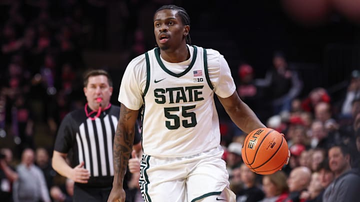 Jan 27, 2026; Piscataway, New Jersey, USA; Michigan State Spartans forward Coen Carr (55) dribbles up court against the Rutgers Scarlet Knights during the first half at Jersey Mike's Arena. Mandatory Credit: Vincent Carchietta-Imagn Images
