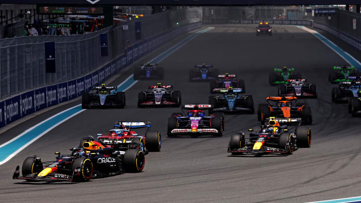 May 4, 2024; Miami Gardens, Florida, USA; Red Bull Racing driver Max Verstappen (1) leads the start of the F1 Sprint Race at Miami International Autodrome. Mandatory Credit: Peter Casey-USA TODAY Sports