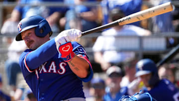 Texas Rangers first baseman Blaine Crim (74) bats against the Los Angeles Dodgers