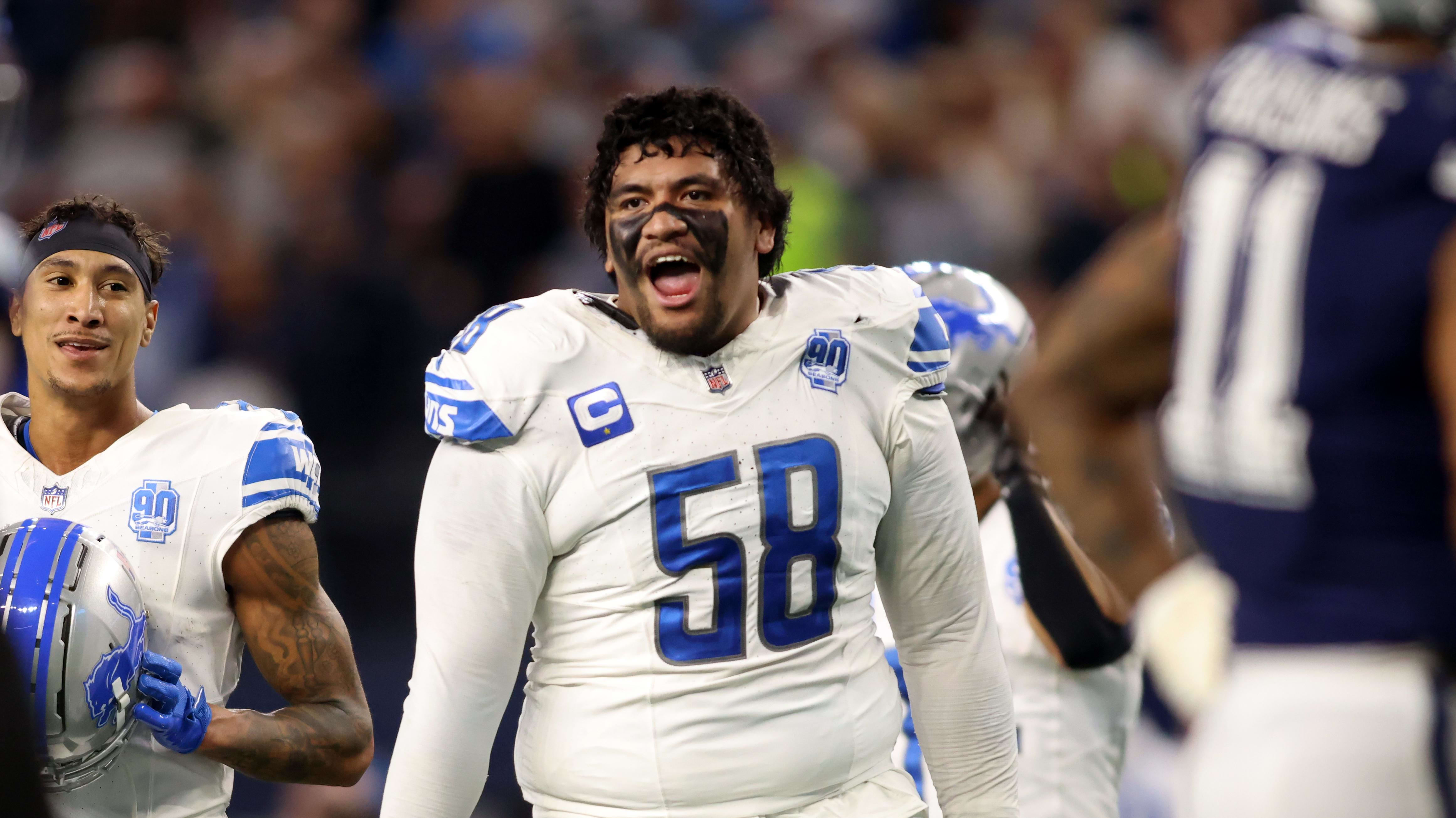 Detroit Lions offensive tackle Penei Sewell (58) reacts.