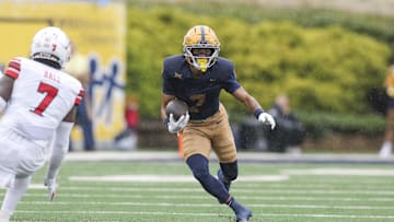 Sep 27, 2025; Morgantown, West Virginia, USA; West Virginia Mountaineers wide receiver Jarod Bowie (7) runs for extra yards after a catch during the first quarter against the Utah Utes at Milan Puskar Stadium. Mandatory Credit: Ben Queen-Imagn Images