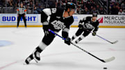 Feb 24, 2025; Los Angeles, California, USA; Los Angeles Kings right wing Quinton Byfield (55) controls the puck against the Vegas Golden Knights during the third period at Crypto.com Arena. Mandatory Credit: Gary A. Vasquez-Imagn Images