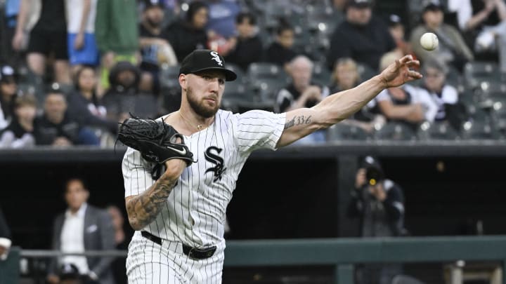 Jun 7, 2024; Chicago, Illinois, USA;  Chicago White Sox pitcher Garrett Crochet (45) commits a throwing error to first base against the Boston Red Sox during the third inning at Guaranteed Rate Field.