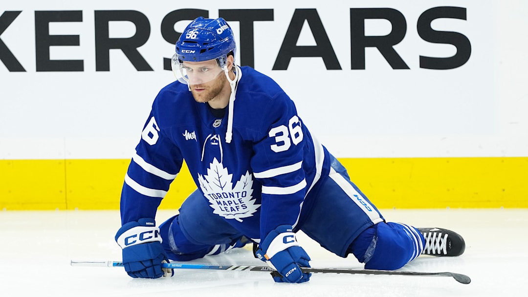 Apr 17, 2025; Toronto, Ontario, CAN; Toronto Maple Leafs defenseman Dakota Mermis (36) stretches during the warmup before a game against the Detroit Red Wings at Scotiabank Arena. Mandatory Credit: Nick Turchiaro-Imagn Images