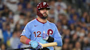 Oct 8, 2025; Los Angeles, California, USA; Philadelphia Phillies designated hitter Kyle Schwarber (12) looks on during the seventh inning against the Los Angeles Dodgers during game three of the NLDS round for the 2025 MLB playoffs at Dodger Stadium. Mandatory Credit: Jayne Kamin-Oncea-Imagn Images