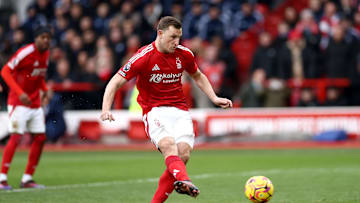Chris Wood completed his hat trick from the penalty spot against Brighton.