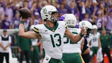 Oct 18, 2025; Fort Worth, Texas, USA; Baylor Bears quarterback Sawyer Robertson (13) throws downfield against the TCU Horned Frogs during the first half of a game at Amon G. Carter Stadium. Mandatory Credit: Raymond Carlin III-Imagn Images