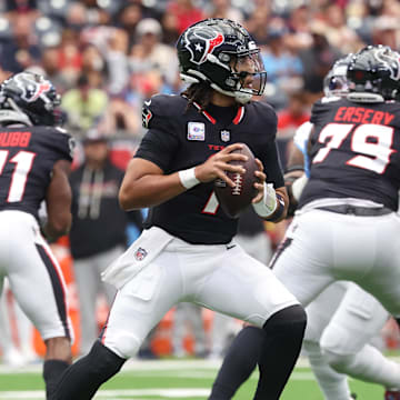 Sep 28, 2025; Houston, Texas, USA; Houston Texans quarterback CJ. Stroud (7) drops to pass during the first half against the Tennessee Titans at NRG Stadium. Mandatory Credit: Troy Taormina-Imagn Images