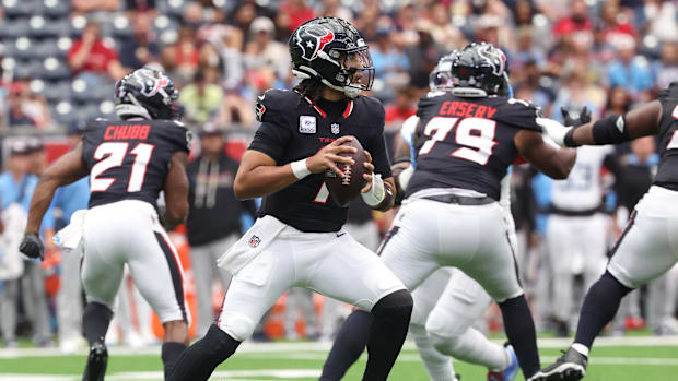 Sep 28, 2025; Houston, Texas, USA; Houston Texans quarterback CJ. Stroud (7) drops to pass during the first half against the 