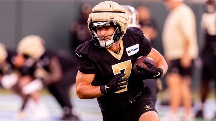 Aug 20, 2024; New Orleans, LA, USA;  New Orleans Saints quarterback Taysom Hill (7) rushes with the ball during practice at Yulman Stadium (Tulane). Mandatory Credit: Stephen Lew-USA TODAY Sports