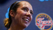 Indiana Fever guard Lexie Hull (10) smiles while answering a question Tuesday, Sept. 17, 2024, after an Indiana Fever practice at Gainbridge Fieldhouse in Indianapolis.