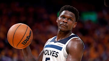 May 12, 2025; San Francisco, California, USA; Minnesota Timberwolves guard Anthony Edwards (5) holds onto the ball after being called for a foul against the Golden State Warriors in the third quarter during game four of the second round for the 2025 NBA Playoffs at Chase Center. Mandatory Credit: Cary Edmondson-Imagn Images