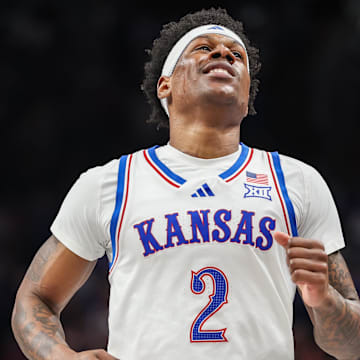 Mar 12, 2025; Kansas City, MO, USA; Kansas Jayhawks guard AJ Storr (2) reacts after a play during overtime against the UCF Knights at T-Mobile Center. 