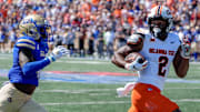 Oklahoma State wide receiver Talyn Shettron (2) catches a pass thrown by Oklahoma State quarterback Alan Bowman (7) for a touchdown in the first half during an NCAA football game between Oklahoma State and Tulsa in Tulsa, Okla., on Saturday, Sept. 14, 2024.