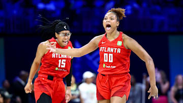 Jul 30, 2025; Arlington, Texas, USA;  Atlanta Dream forward Naz Hillmon (00) celebrates with Atlanta Dream guard Allisha Gray (15) after hitting the game-winning shot against the Dallas Wings during the second half at College Park Center. Mandatory Credit: Kevin Jairaj-Imagn Images