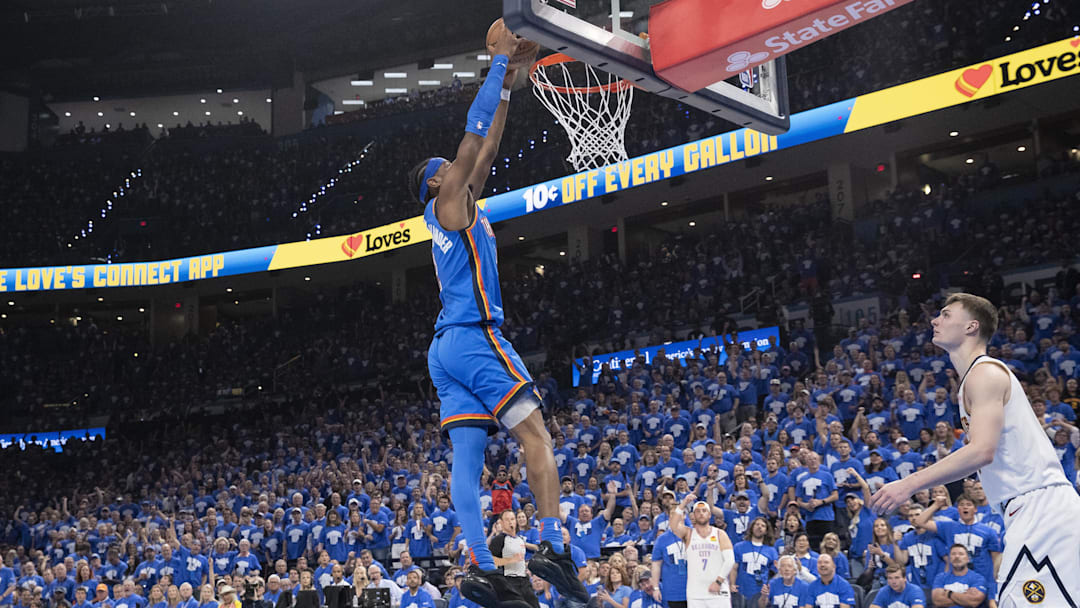May 18, 2025; Oklahoma City, Oklahoma, USA; Oklahoma City Thunder guard Shai Gilgeous-Alexander (2) dunks against the Denver Nuggets during the second half in Game 7 of the second round at Paycom Center. Mandatory Credit: Alonzo Adams-Imagn Images