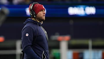 Dec 26, 2021; Foxborough, Massachusetts, USA; New England Patriots special teams coordinator Brian Belichick watches from the sideline as they take on the Buffalo Bills in the second half at Gillette Stadium. Mandatory Credit: David Butler II-Imagn Images