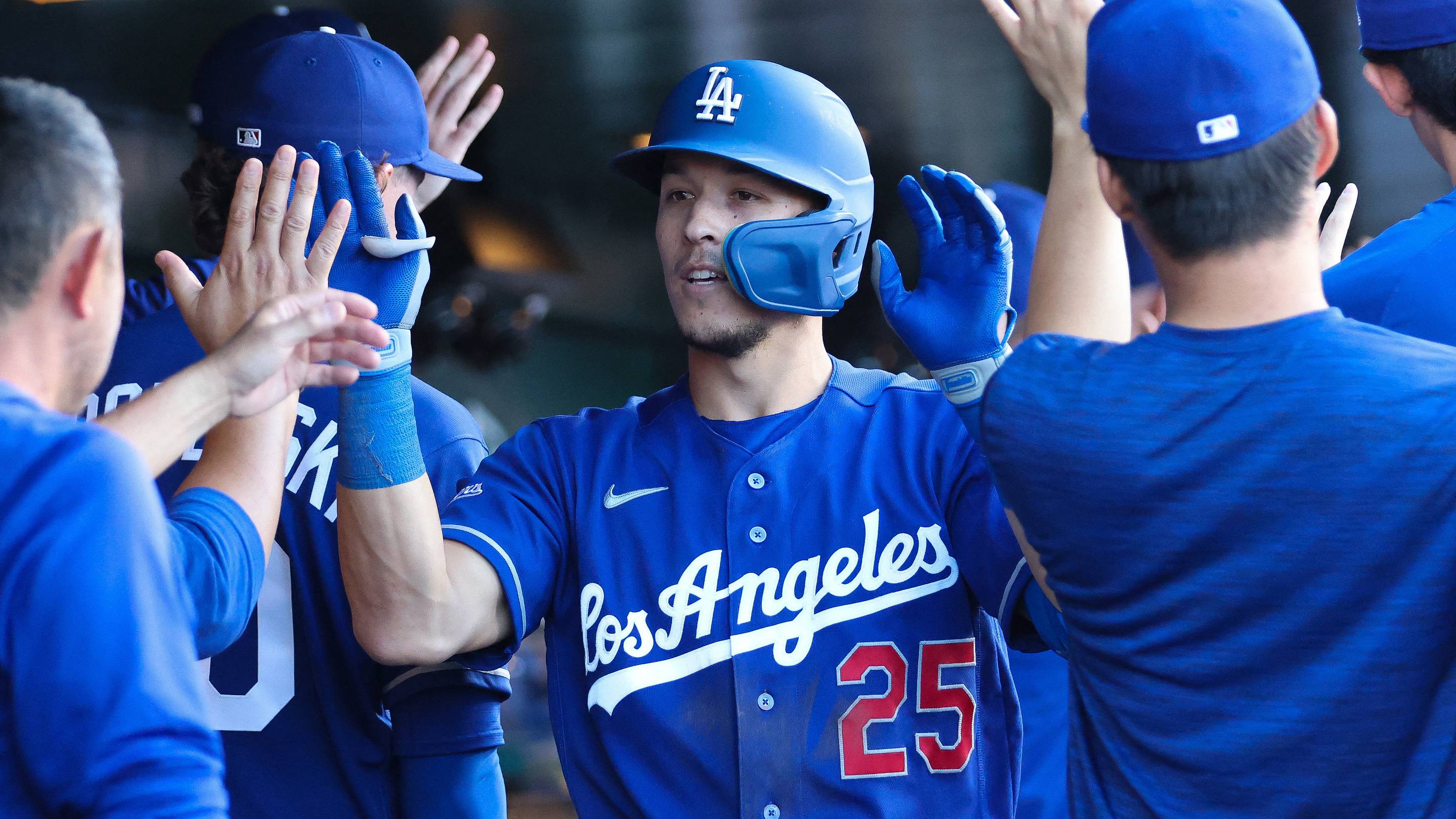 Jun 30, 2026; West Sacramento, California, USA; Los Angeles Dodgers third baseman Tommy Edman (25) celebrates in the dugout with his teammates after hitting a three-run home run during the third inning against the Athletics at Sutter Health Park. Mandatory Credit: Scott Marshall-Imagn Images