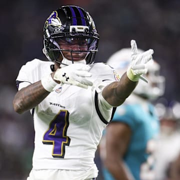 Oct 30, 2025; Miami Gardens, Florida, USA; Baltimore Ravens wide receiver Zay Flowers (4) reacts after a play against the Miami Dolphins in the third quarter at Hard Rock Stadium. Mandatory Credit: Nathan Ray Seebeck-Imagn Images