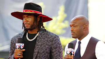 Jul 9, 2019; Cleveland, OH, USA; Pittsburgh Pirates first baseman Josh Bell (55) with Harold Reynolds on the red carpet prior to the 2019 MLB All Star Game at Progressive Field. 