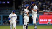 Apr 15, 2024; Los Angeles, California, USA;  Los Angeles Dodgers pitcher Tyler Glasnow (R) talks with catcher Will Smith (L) during the fifth inning against the Washington Nationals at Dodger Stadium. Mandatory Credit: Kiyoshi Mio-Imagn Images
