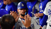 Sep 15, 2025; Los Angeles, California, USA; Los Angeles Dodgers outfielder Andy Pages (44) reacts in the dug out after scoring a run against the Philadelphia Phillies in the third inning at Dodger Stadium. Mandatory Credit: Gary A. Vasquez-Imagn Images