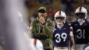 Nov 8, 2025; Charlottesville, Virginia, USA; Virginia Cavaliers head coach Tony Elliott watches players prior to their game against the Wake Forest Demon Deacons at Scott Stadium. Mandatory Credit: Amber Searls-Imagn Images