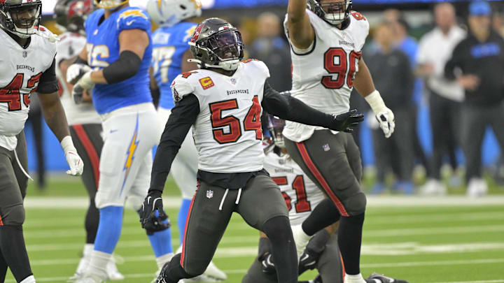 Tampa Bay Buccaneers linebacker Lavonte David (54) celebrates after a sack of Los Angeles Chargers quarterback Justin Herbert (10) in the second half at SoFi Stadium.