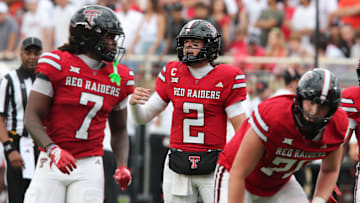 Sep 13, 2025; Lubbock, Texas, USA;  Texas Tech Red Raiders quarterback Behren Morton (2) calls a play against the Oregon State Beavers in the first half at Jones AT&T Stadium. Mandatory Credit: Michael C. Johnson-Imagn Images