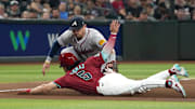 Jul 11, 2024; Phoenix, Arizona, USA; Atlanta Braves third base Austin Riley (27) tags out Arizona Diamondbacks outfielder Alek Thomas (5) in the eighth inning at Chase Field. Mandatory Credit: Rick Scuteri-Imagn Images